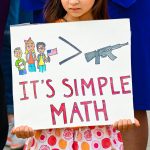 A child protesting gun violence