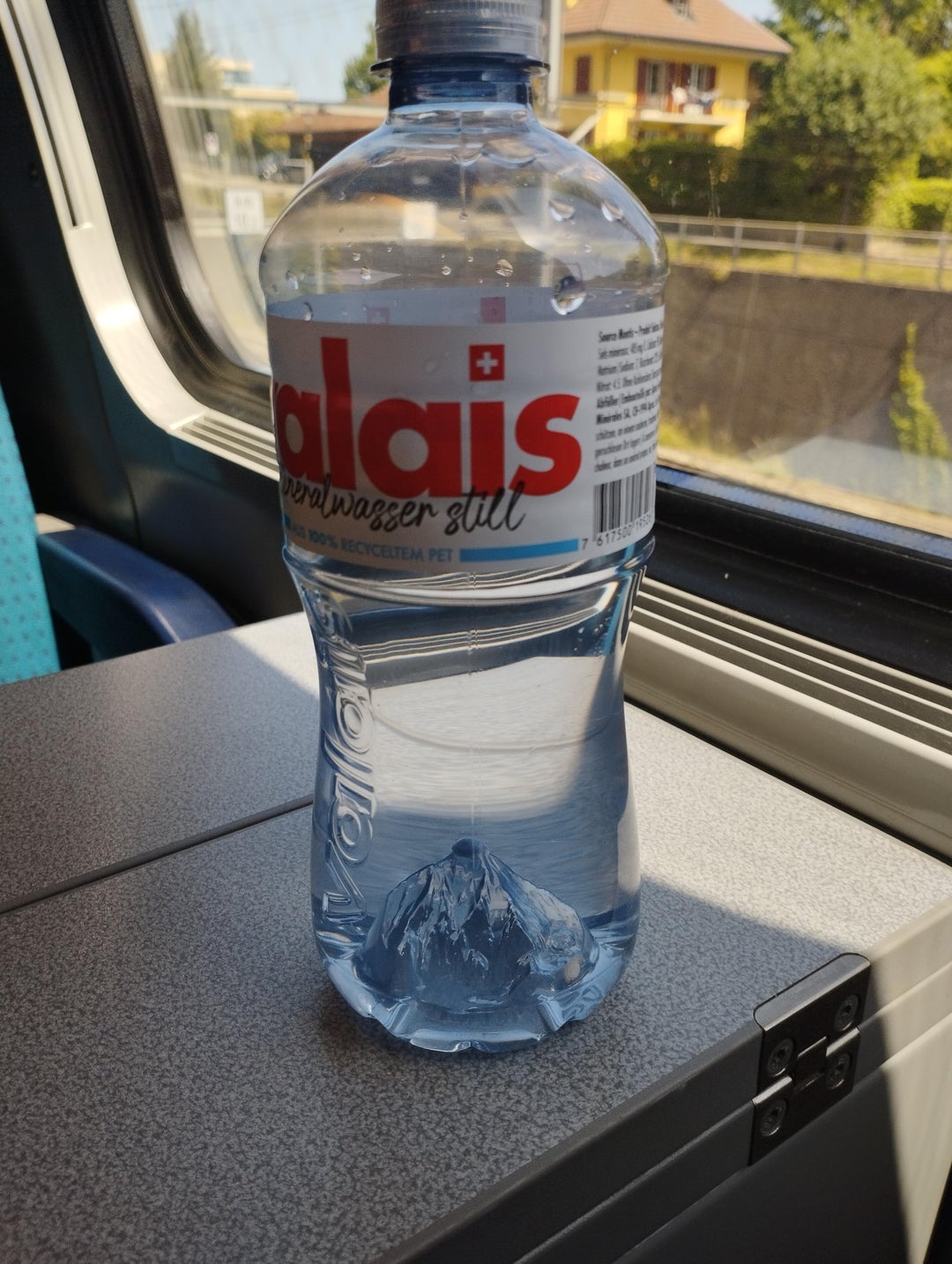 This Swiss water bottle has a tiny mountain dented on the bottom