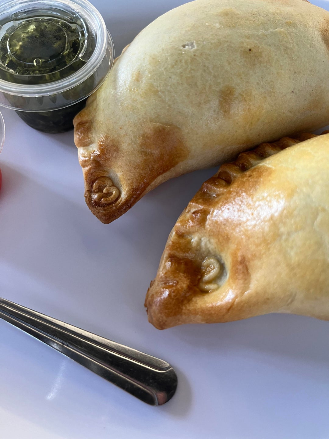 Empanada place by my work stamps each one so you can differentiate the filling