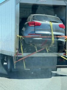 I'm so glad they added a strap to the windshield wiper to properly secure the load