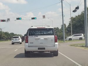 [OC] Saw this on local police car. Not sure what to think about this or what they're trying to say.