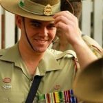 TIL the iconic Australian hat is bent up on one side to allow the armed forces maneuver rifles on and off their shoulders without hitting the brim.
