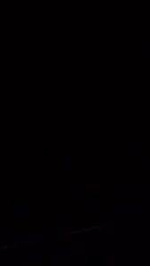the darkness of an ocean during night