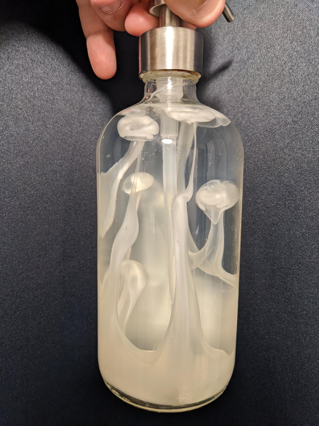 Refilled the soap dispenser with clear soap, apparently more dense than the previous soap