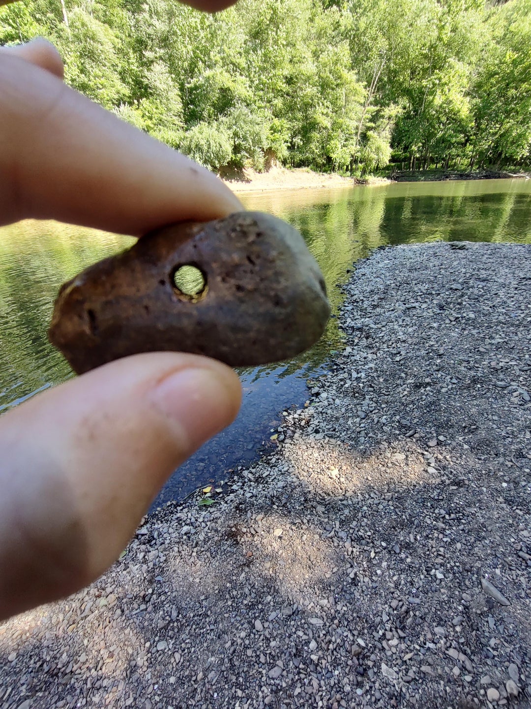 This rock I found with a hole through it