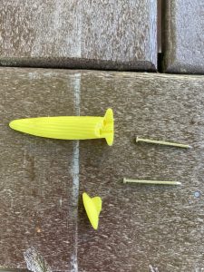 Corn cob holders are just nails in plastic shaped corn