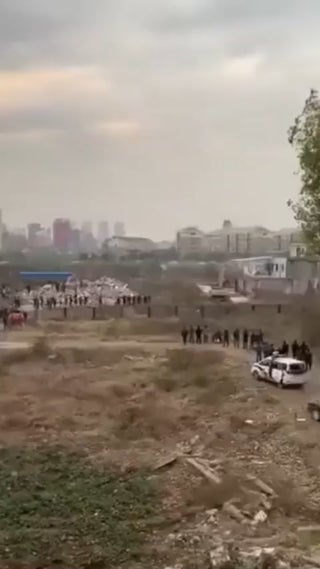 Man in China uses fireworks to defend his home from being destroyed by a company that wanted his land