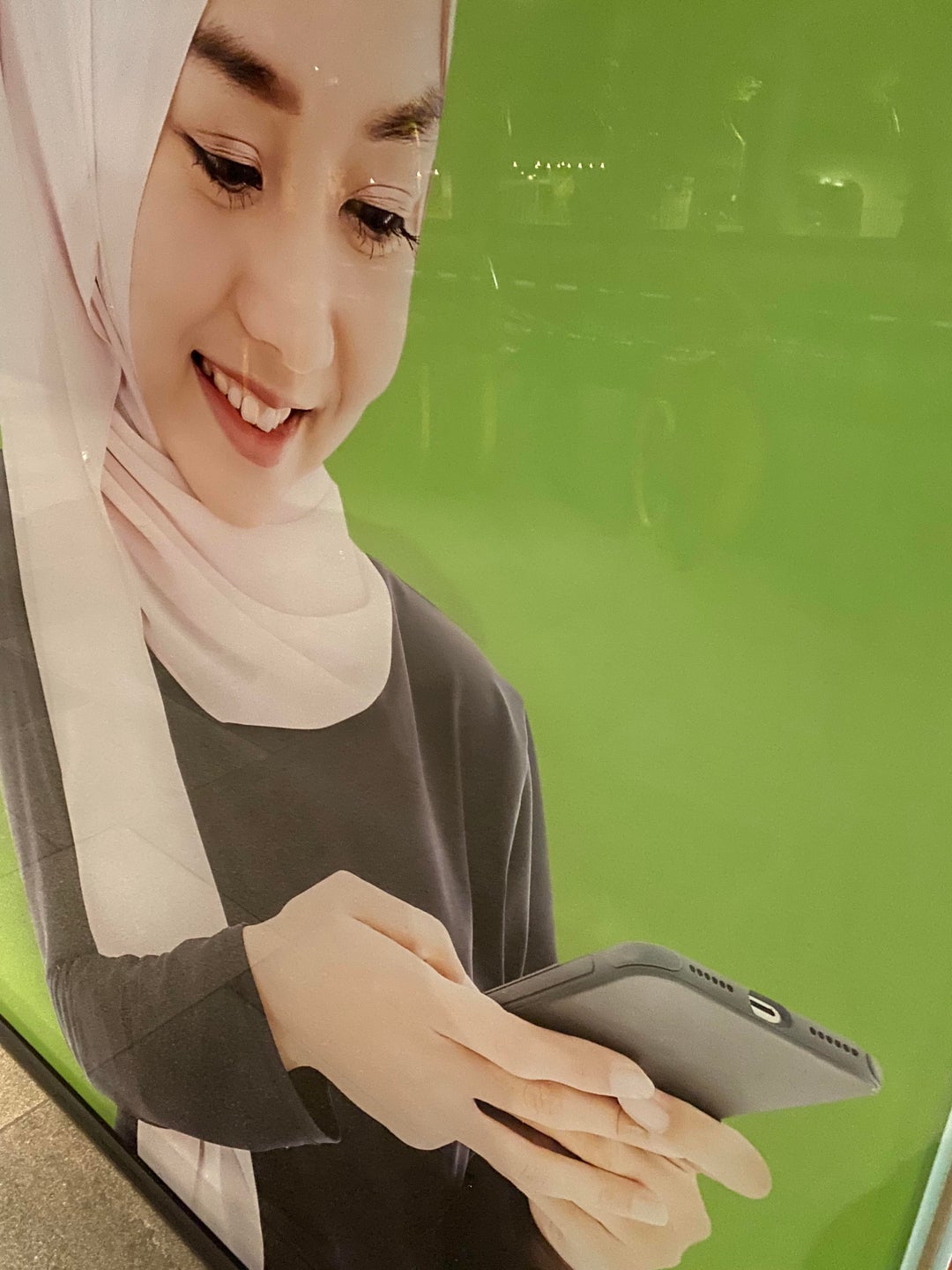 Walked past this image for years and only just noticed that she’s using the phone upside down