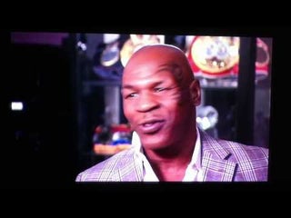 Mike Tyson reacting to a small fight involving Charles Barkley