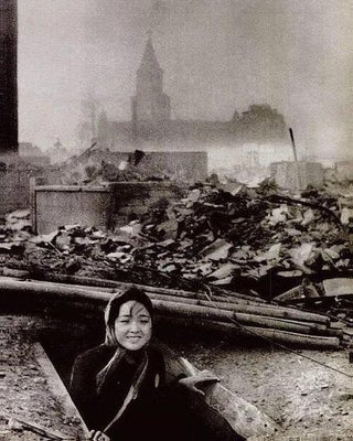A young woman who survived the atomic bombing of Nagasaki , August 1945.