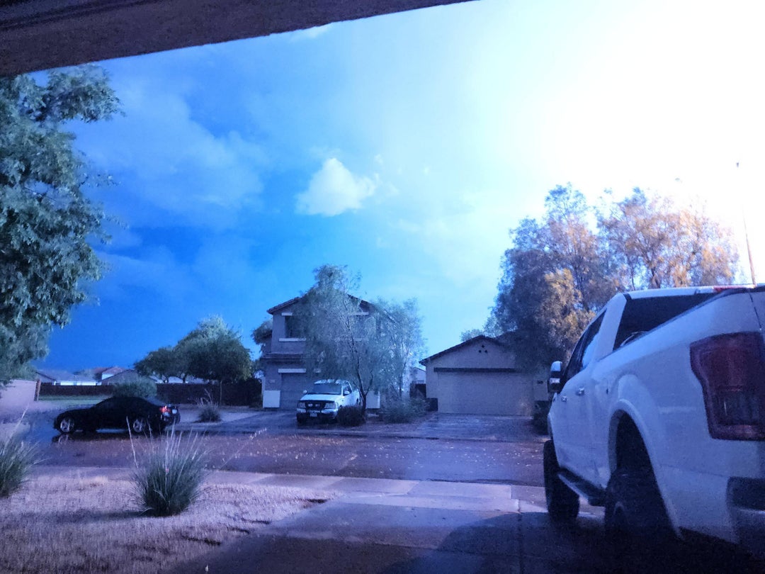 Failed attempt to catch a pic of lightning makes it looks like a daytime photo. Pic taken just past midnight.