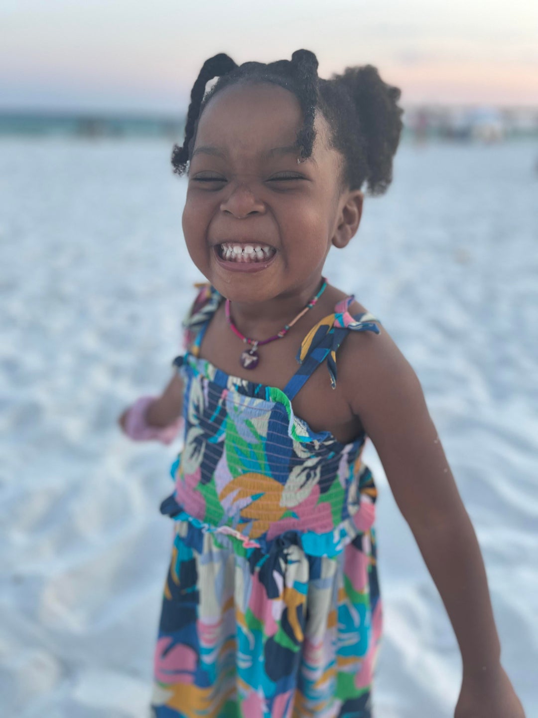 [OC] Took a photo of my girl’s first time at the beach and feeling sand. She didn’t want to leave.