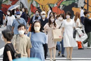 Japan's relaxed mask guidelines not filtering through public