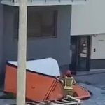 The girl throws various things at the firemen and then...