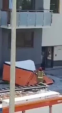 The girl throws various things at the firemen and then...