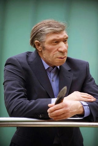 This is what a Neanderthal would look like with a modern haircut and a suit.