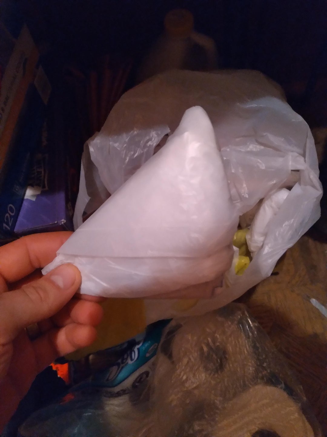 My in-laws fold their leftover plastic bags into triangles.