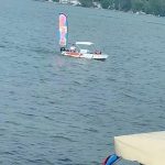 An ice cream boat that stops by the docks of people who live on the lake