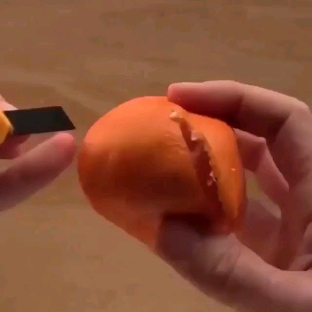 Peeling an orange