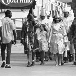 KKK marching during the day