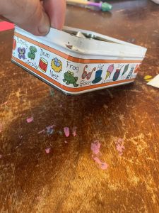 My kid’s alphabet pencil case has Nest in the E spot.