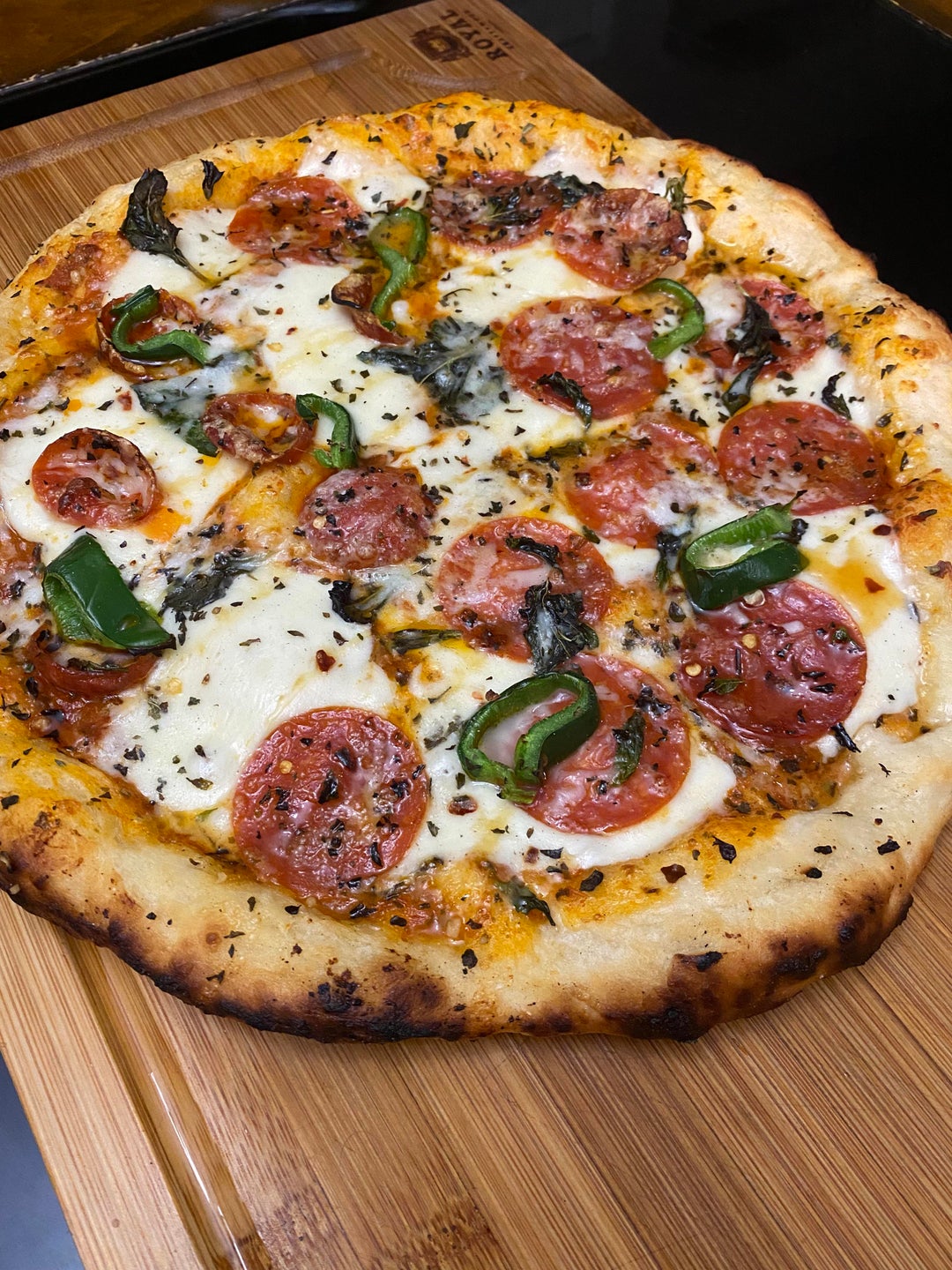 [OC] Homemade wood fired oven pizza