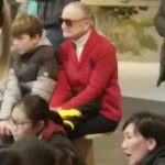 Old lady at aquarium looks like Stan Lee