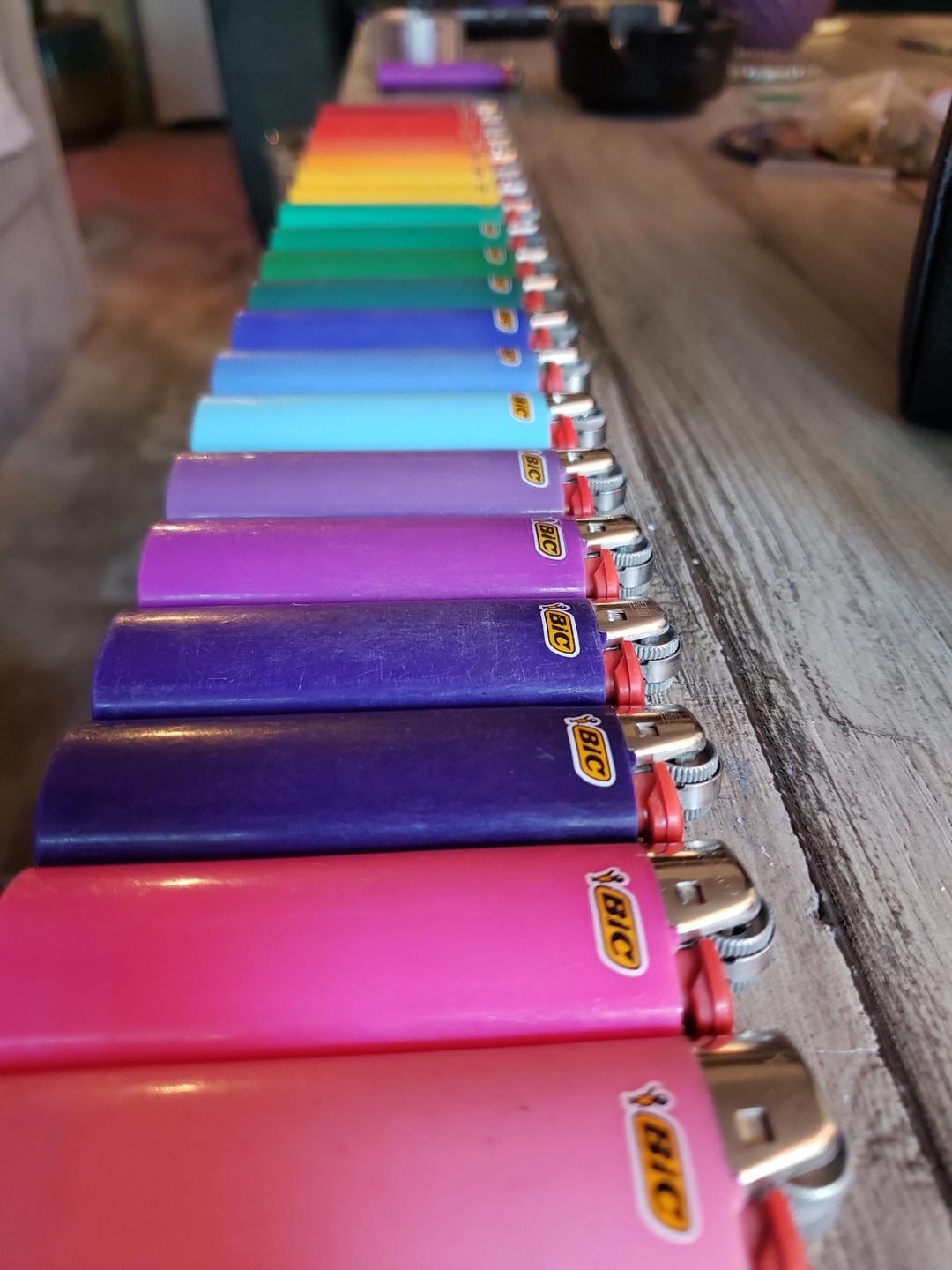 A rainbow of dead (empty) Bic Lighters. I've saved every lighter I've ever bought and emptied. This is nowhere near the whole collection.