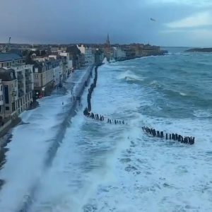 Heavy seas battering houses along the coast in Ste. Malo, France