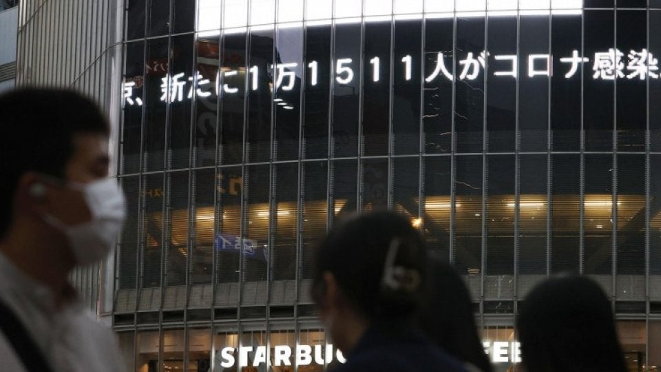 Japan logs most COVID cases since March, delays domestic travel plan