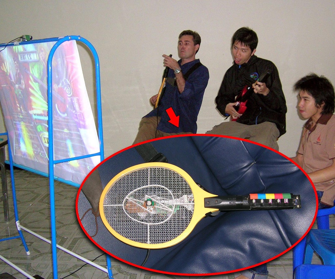 No Guitar Hero guitar? No problem. Back in 2006 we lived in Thailand and I couldn't find a Guitar Hero controller for my PlayStation 2 so I made one out of a mosquito zapper. It even had a mercury switch to activate Star Power.