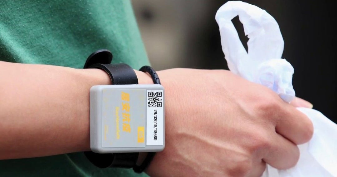 Hong Kong to require people to wear tracking bracelets during Covid-19 quarantine