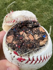 Accidentally cut open a cheap kids baseball with my lawn mower