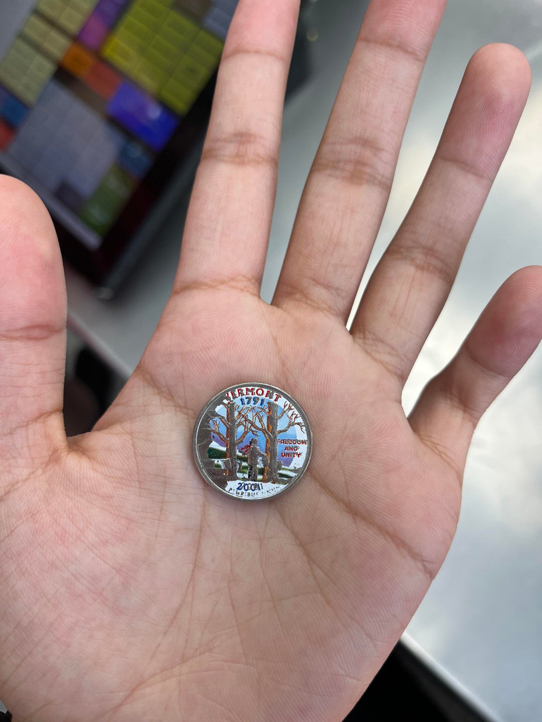 Digital art printed on a quarter that a customer gave me