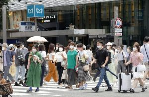 Tokyo's daily COVID-19 cases hit record above 30,000