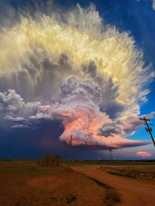 In west Texas, storm chaser Laura Rowe captured this fantastic shot of a mature supercell thunderstorm, illuminated at varying heights by the setting sun.
