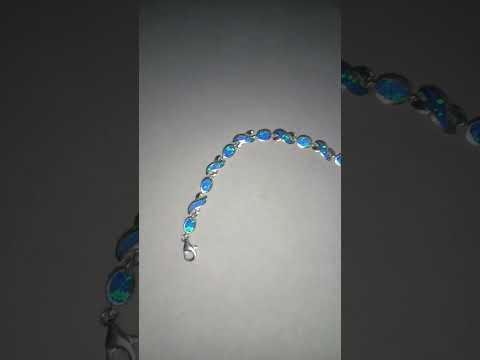 Solid 925 Sterling Silver lab Opal infinity link bracelet.